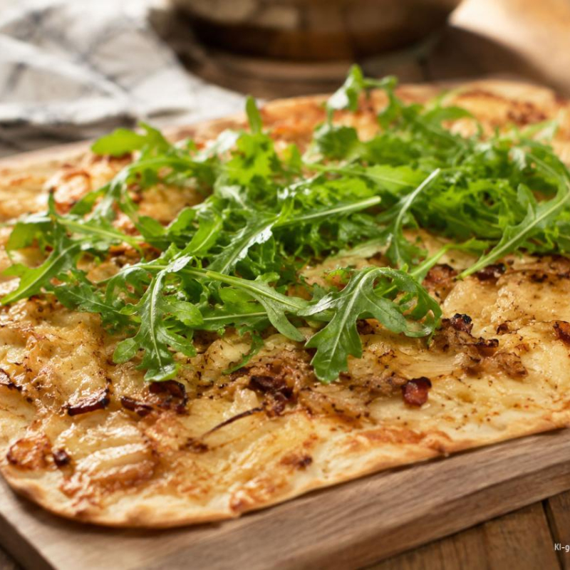 ​  Vegetarischer Zwiebelkuchen auf Flammkuchenteig